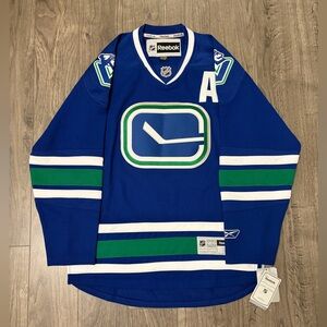 Reebok Royal Blue and Green Vancouver Canucks Hockey Jersey